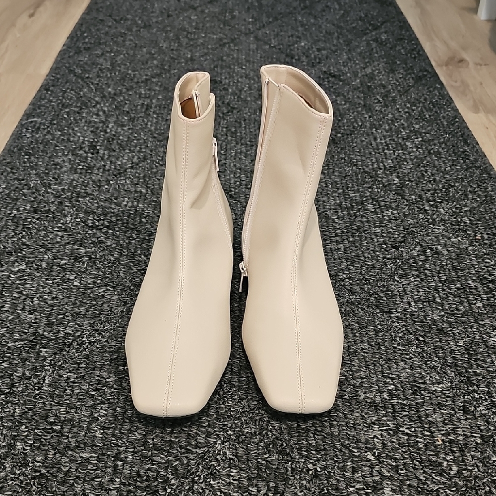 Paolo Cream Ankle Booties with Sleek Slip-On Design